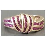 Tested 14k gold ring s/w channel set rubies- 3.4g,