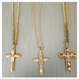 Three 10k Black Hills gold cross pendants on