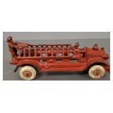 Antique A C Williams cast iron hook & ladder truck
