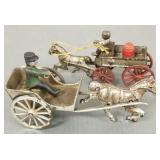 2 antique cast iron horse drawn farm wagon &