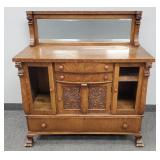 Antique oak buffet with carved lion heads, paw