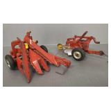 2 antique Arcade cast iron farm implements: