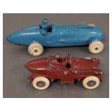 2 antique cast iron boat tail race cars: