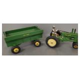 2 antique Arcade cast iron toys: tractor w/ driver