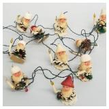 Vintage light up string of 11 pinecone figures