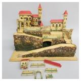 Antique German folk art mountainside town/
