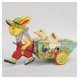 Vintage J. Chein tin litho bunny with cart &