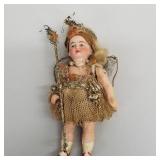 Miniature antique bisque head doll with jointed