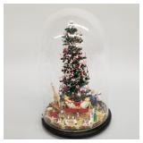 Miniature Christmas tree tableau under glass dome