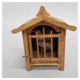 Antique wooden chicken pipsqueak toy with applied