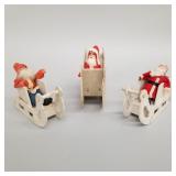 3 vintage Santas with white sleighs- largest