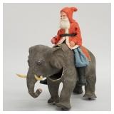 Antique German woodcutter Santa riding nodding