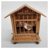 Antique wooden & papier-mache pipsqueak toy on
