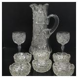 9 brilliant cut glass pieces: two- 6.5"H goblets,