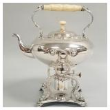 Large antique silverplate tilting kettle on stand
