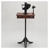 Elliott Button Fastener Co. machine on oak
