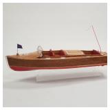 Large Cris Craft wooden model boat on stand-