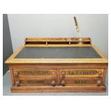 J.P. Coats oak 4-drawer lift top desk- 15"H 30"L