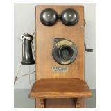 Monarch oak wall telephone- retrofitted inside to