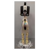 Unsigned figural sculpture of found objects 21'H