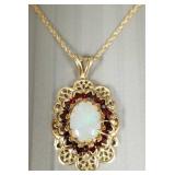 10K gold pendant s/w opal & garnets on 10k chain-