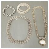 4 sterling silver items: 2 necklaces & 2 bracelets