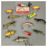 12 vintage, etc. fishing lures incl Heddon, etc.