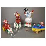 4 vintage hard plastic Christmas candy containers,