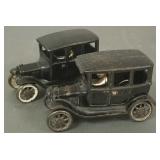 2 vintage Arcade cast iron sedans w/ drivers-