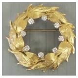 18K gold leaf circle pin s/w 8 diamonds- 8.9g;