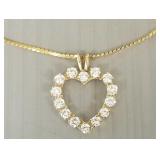 14K gold heart pendant necklace s/w clear stones-