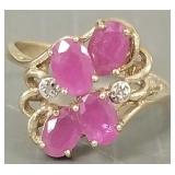 10K gold ring s/w 4 pink stones; 2.7g; size 7 3/4
