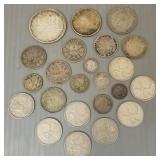 Small group asst. foreign silver coins & currency