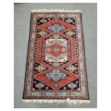 Wool oriental rug (fringe as seen) approx. 4