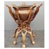 Carved camel form wooden stand w/ hammered copper