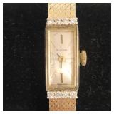 14K gold Glycine ladies wristwatch w/ 8 diamond