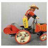 Vintage 8 1/2' Marx tin wind-up cowboy whoopee car