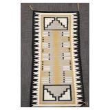Woven Navajo rug- 24' x 42'