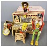 Unique Art tin dog patch band wind-up toy (working