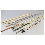 9 asst. fishing rods- some w/ reels incl Heddon