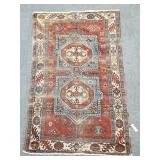 Vintage handmade Kazak rug- approx. 5' x 8' -