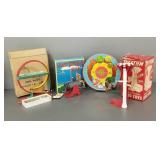 4 vintage toys: marble game, Coast Defense Gun,