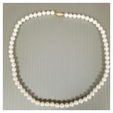 17" strand of 6.5mm pearls w/ 14k gold clasp