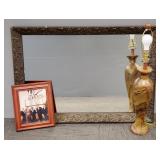 3 items: large ornately framed mirror with raised