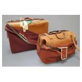 Gp vintage leather items: 2 suitcases w/ cloth