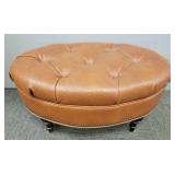 Lg faux ostrich upholstered footstool- 16"H 34"W