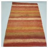 Large woven rag rug (some paint spots) 9'4'x 5'11'