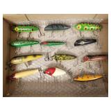 12 vintage fishing lures incl South Bend Surf-