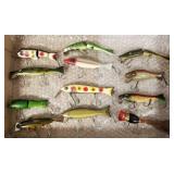 12 vintage fishing lures incl Creek Chub, Paw Paw,