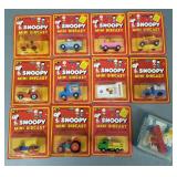 12 vintage Snoopy mini die cast toys in unopened